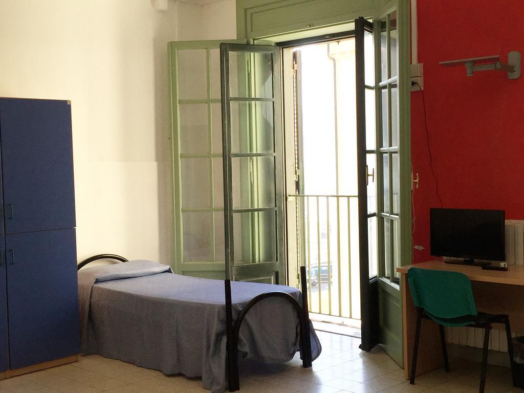 Litus Roma Hostel ลิโด ดิ ออสเตีย ภายนอก รูปภาพ A typical room at the university